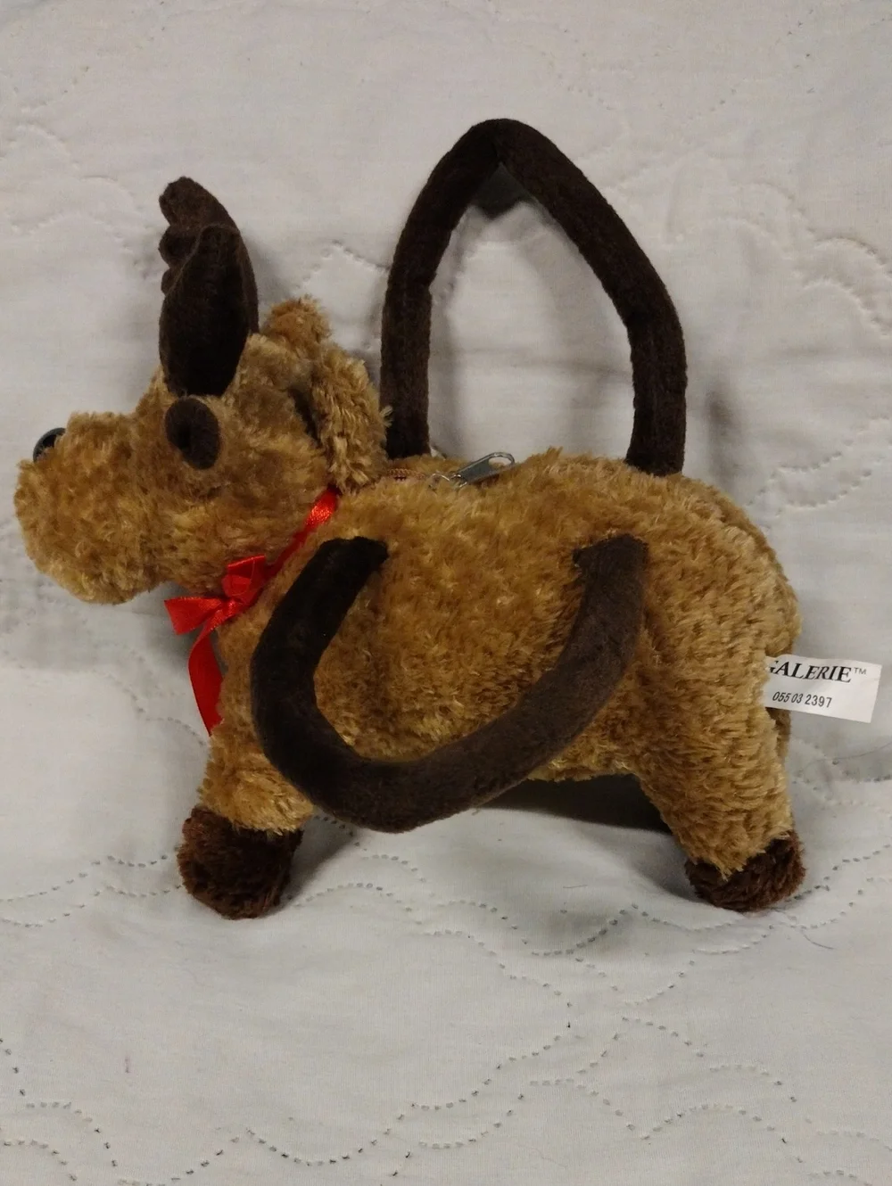 Galerie Reindeer Purse With A Red Ribbon